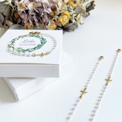 6 pulseras perlas con cruz dorada