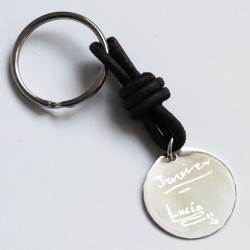 Llavero de plata con dibujo o firma de niños