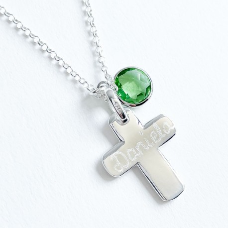 Cruz de plata con alas