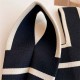 Bolso de punto con iniciales y rayas