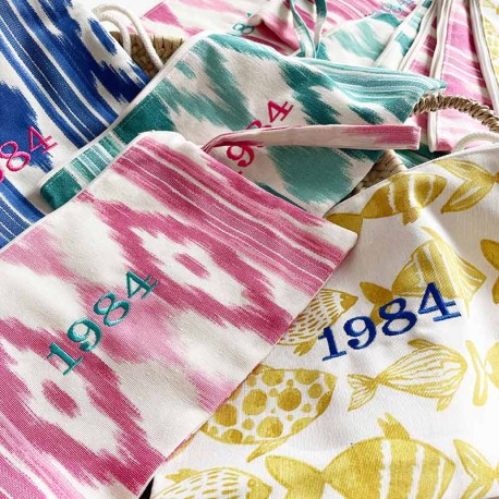 Neceseres ikat personalizados